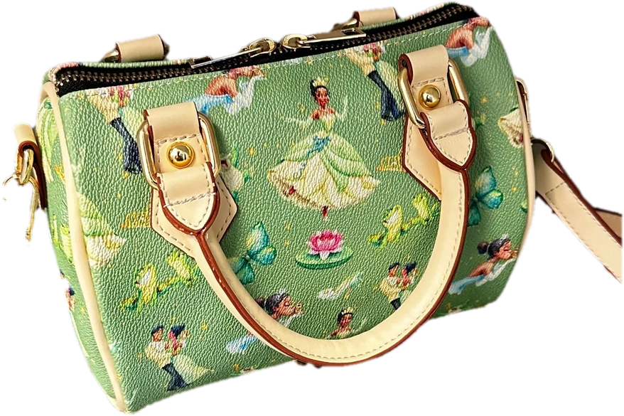 In the Bayou Duffle Bag in green with cream leather handles